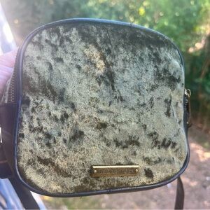 MADDEN GIRL velvet type with soft faux leather. Two zippers and adjustable strap